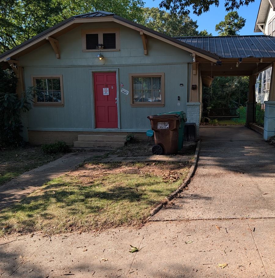After: the same driveway cleared and swept